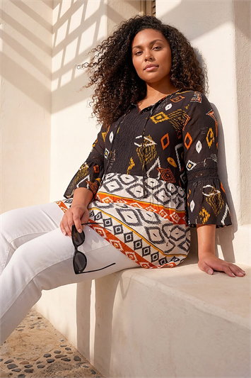 Orange Curve Ikat Print Woven Top
