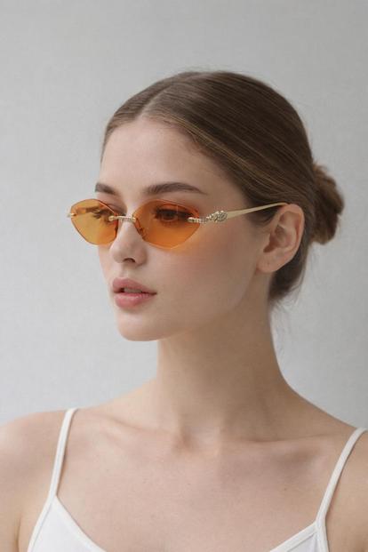 Pink Rimless Oval Geo Metal Sunglasses In Orange