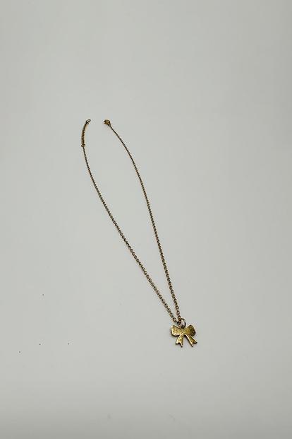Metallic Mini Bow Pendant Necklace In Gold