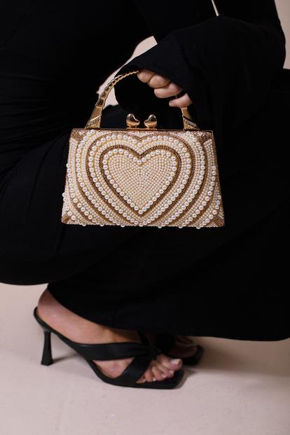 Metallic Heart Pearl Clutch Bag In Gold