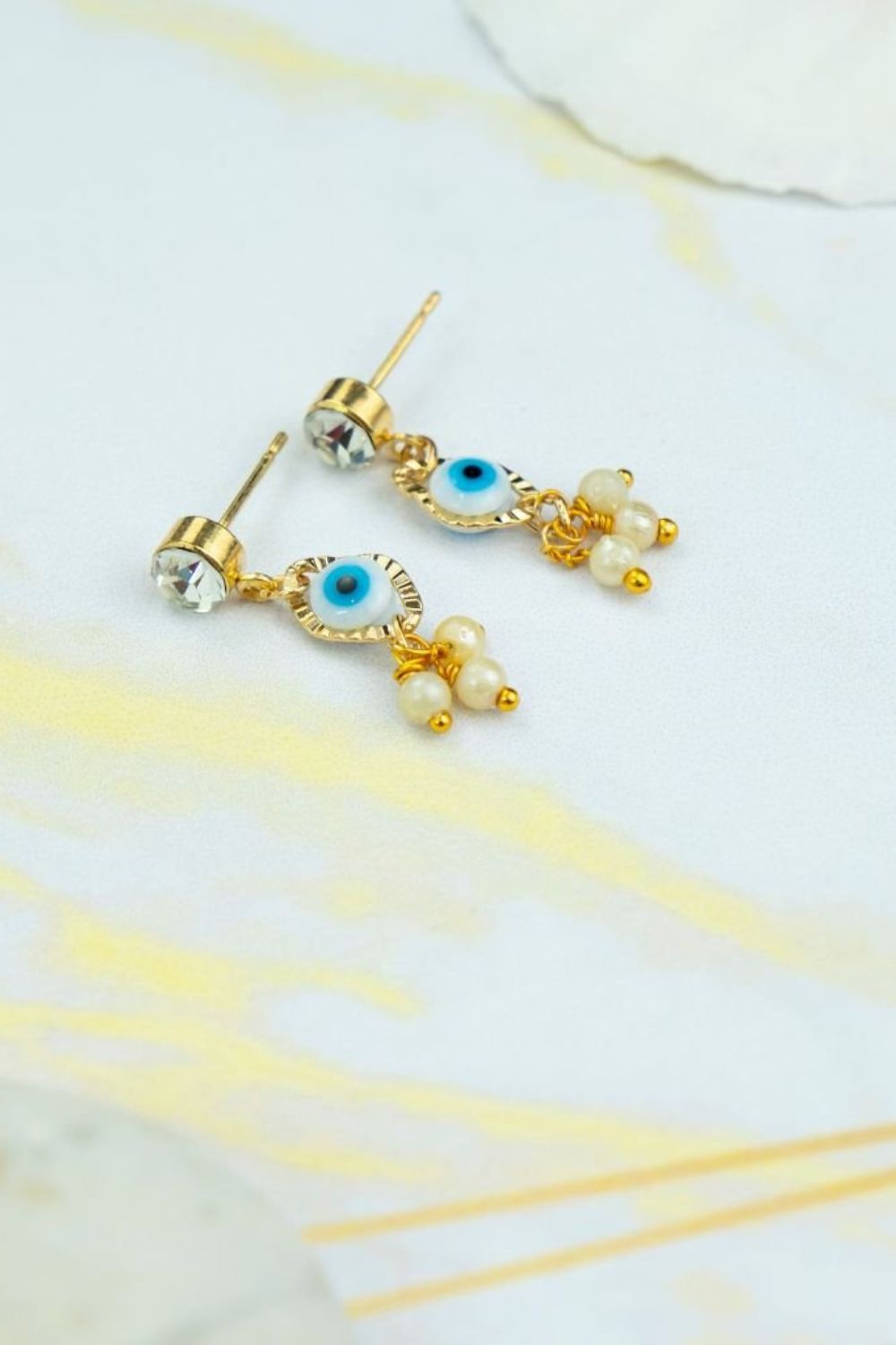 Gold The Colourful Aura Gold Tiny Pearl Zircon Evil Eye Dangle Stud Earrings, Image 2 of 2