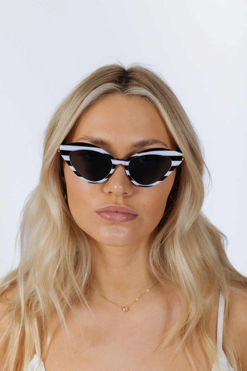Brown Cat-Eye Sunglasses in Black White Stripe, Image 1 of 6