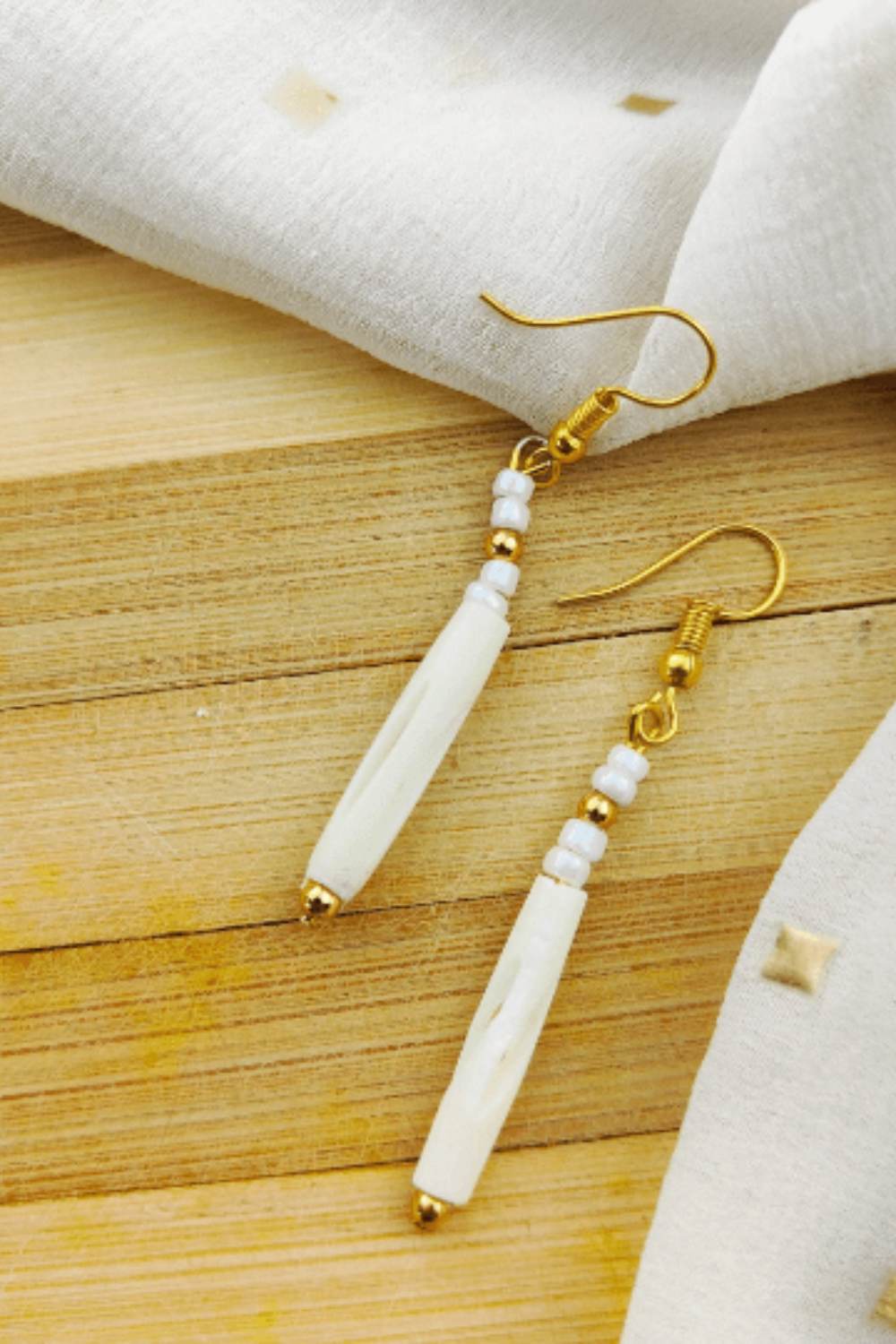 White The Colourful Aura White Long Pipe Slim Shell Hook Earrings, Lightweight White Drop, Image 1 of 3