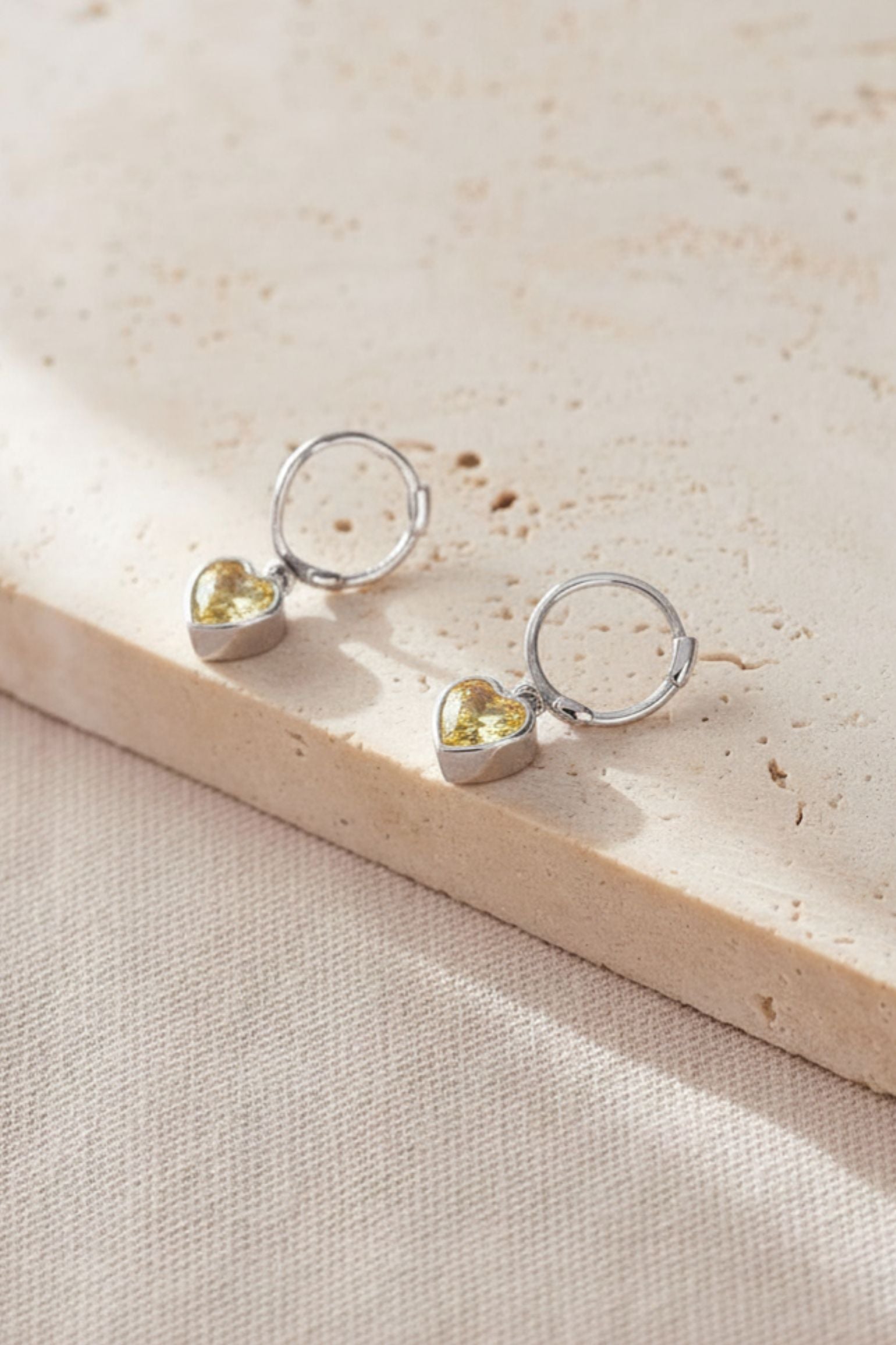Champagne Sterling Silver CZ Heart Huggie Hoops, Image 1 of 2