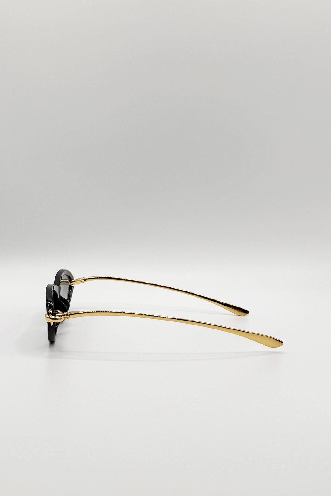 Black Bold Oval Angular Sunglasses in Black, Image 4 of 5
