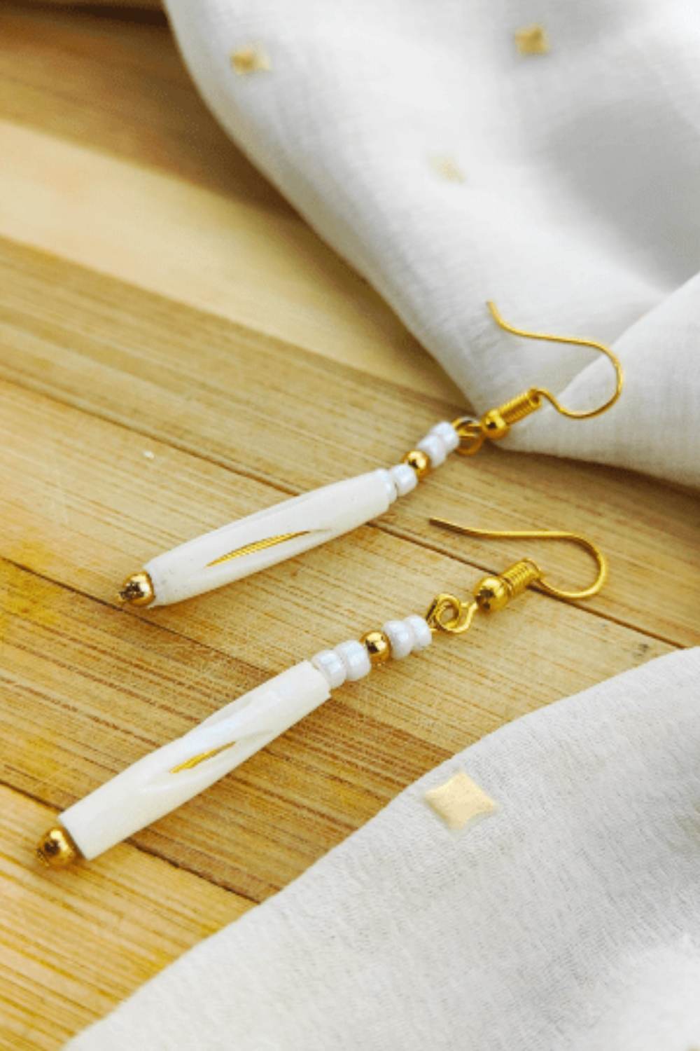 White The Colourful Aura White Long Pipe Slim Shell Hook Earrings, Lightweight White Drop, Image 3 of 3