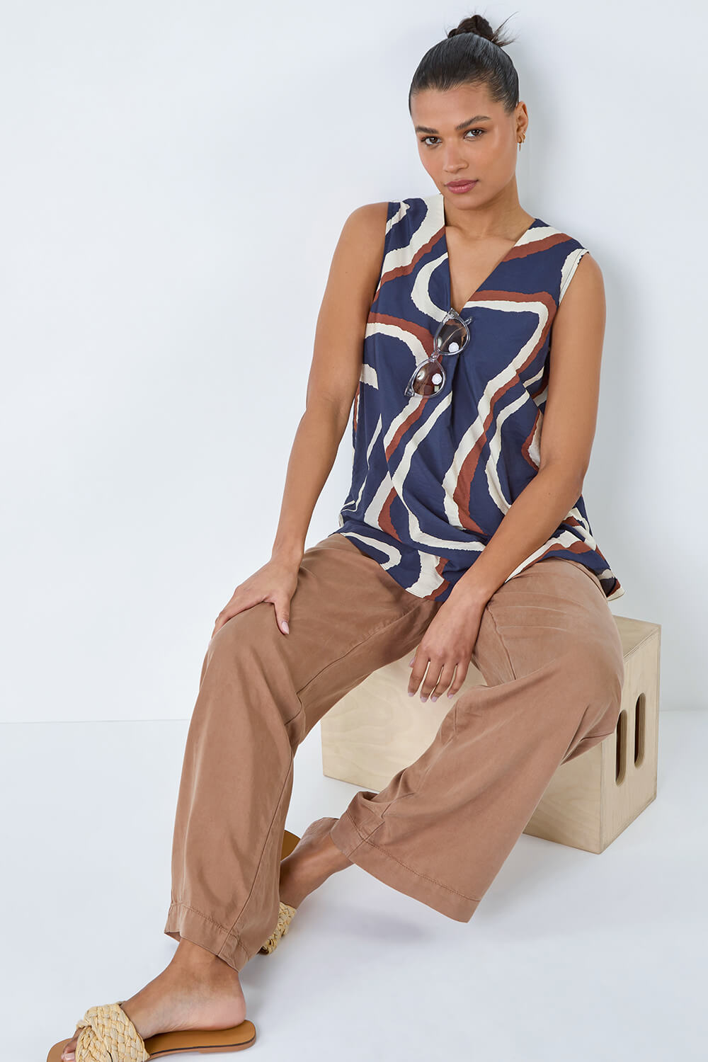 Navy Sleeveless V-Neck Swirl Print Pleat Front Top, Image 1 of 5