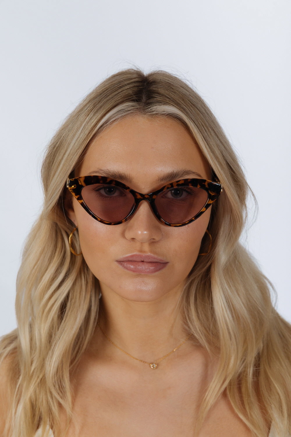 Brown Cat-Eye Sunglasses with Thin Chain Arm Tortoise, Image 1 of 6