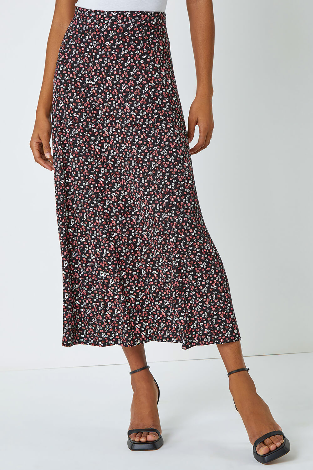 lllNew vacay Black ditzy floral midi skirt high waist front split . L main image 0
