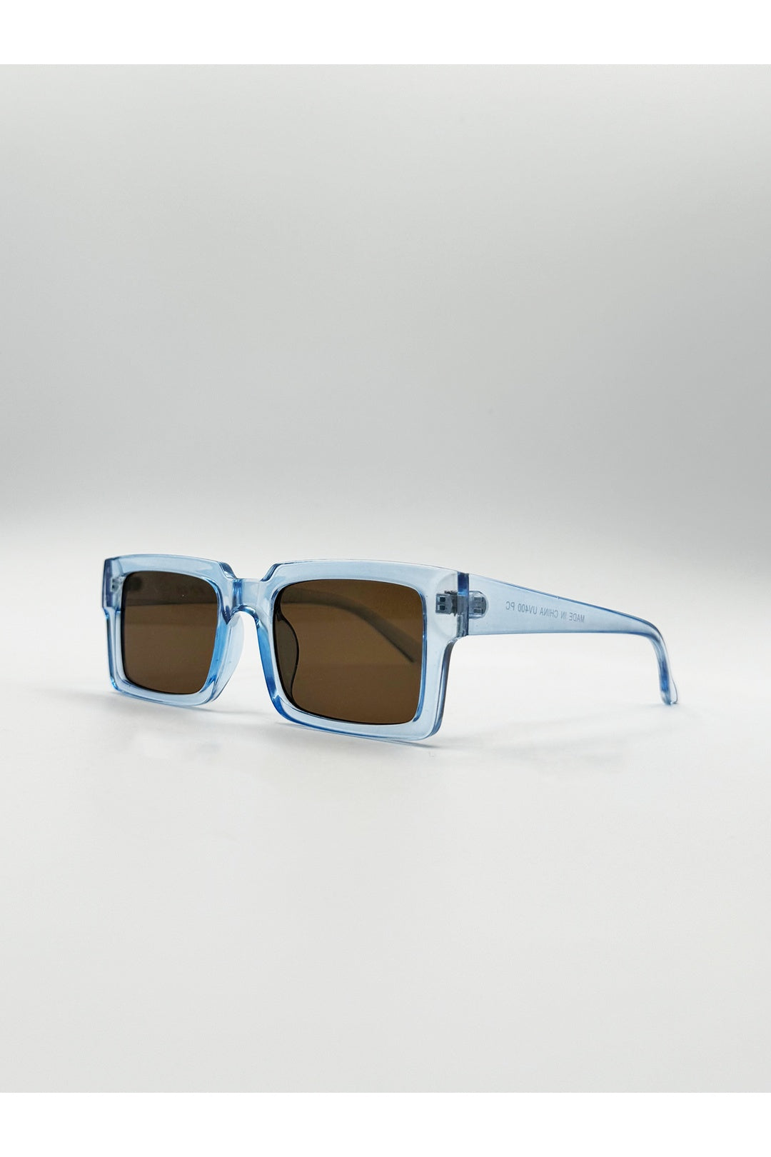 Blue Square Frame Sunglasses in Translucent Blue with Brown Lenses, Image 2 of 4