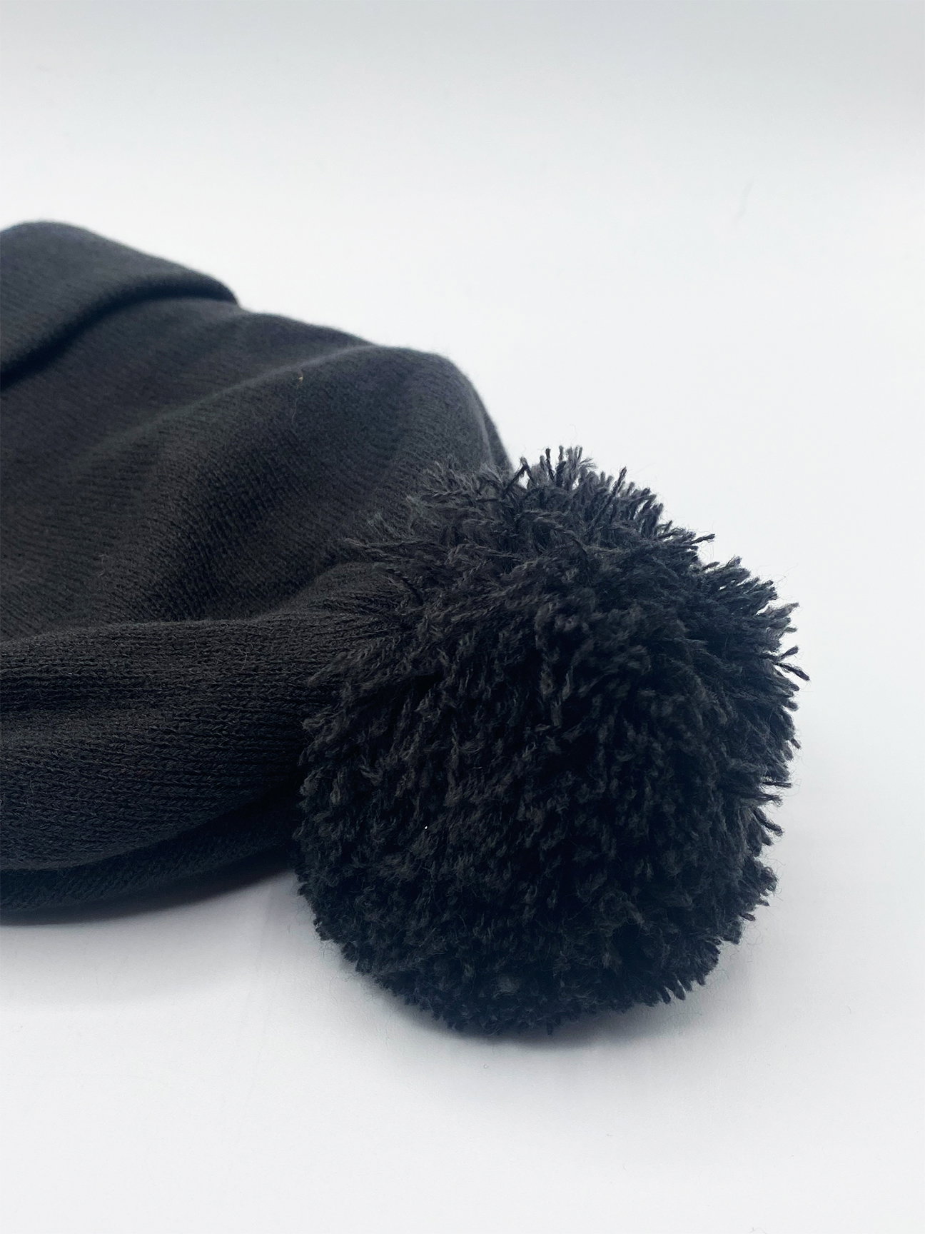 Dark Grey Knitted Pom Pom Beanie in Black, Image 7 of 7