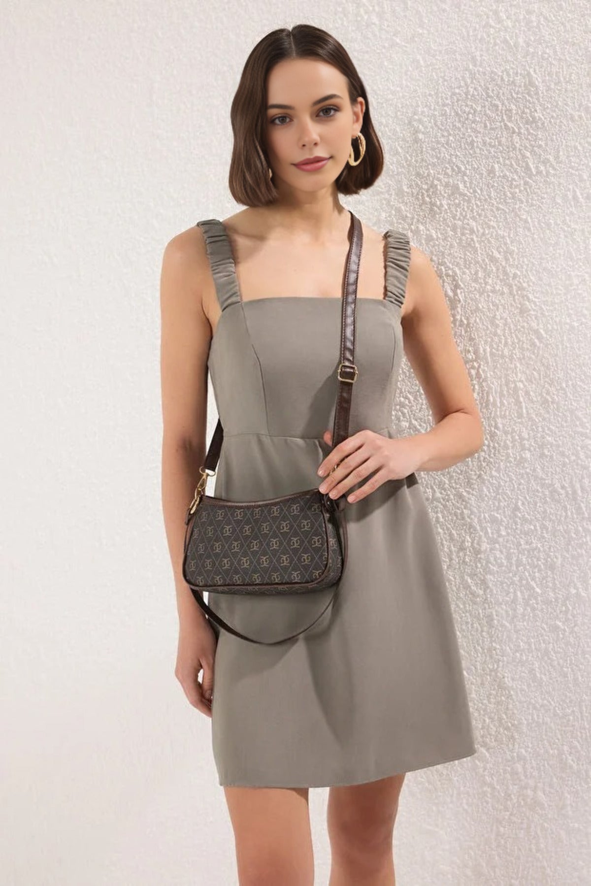 Dark Brown WOVCOR Dark Brown Patterned Adjustable Strap Mini City Shoulder Bag, Image 1 of 3