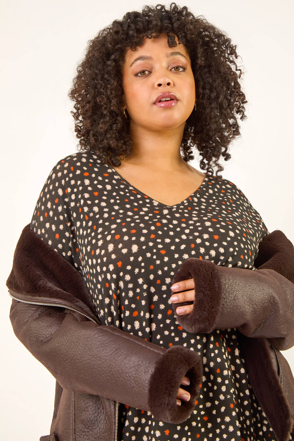 Black Curve Spotted V-Neck Stretch Top, Image 1 of 5