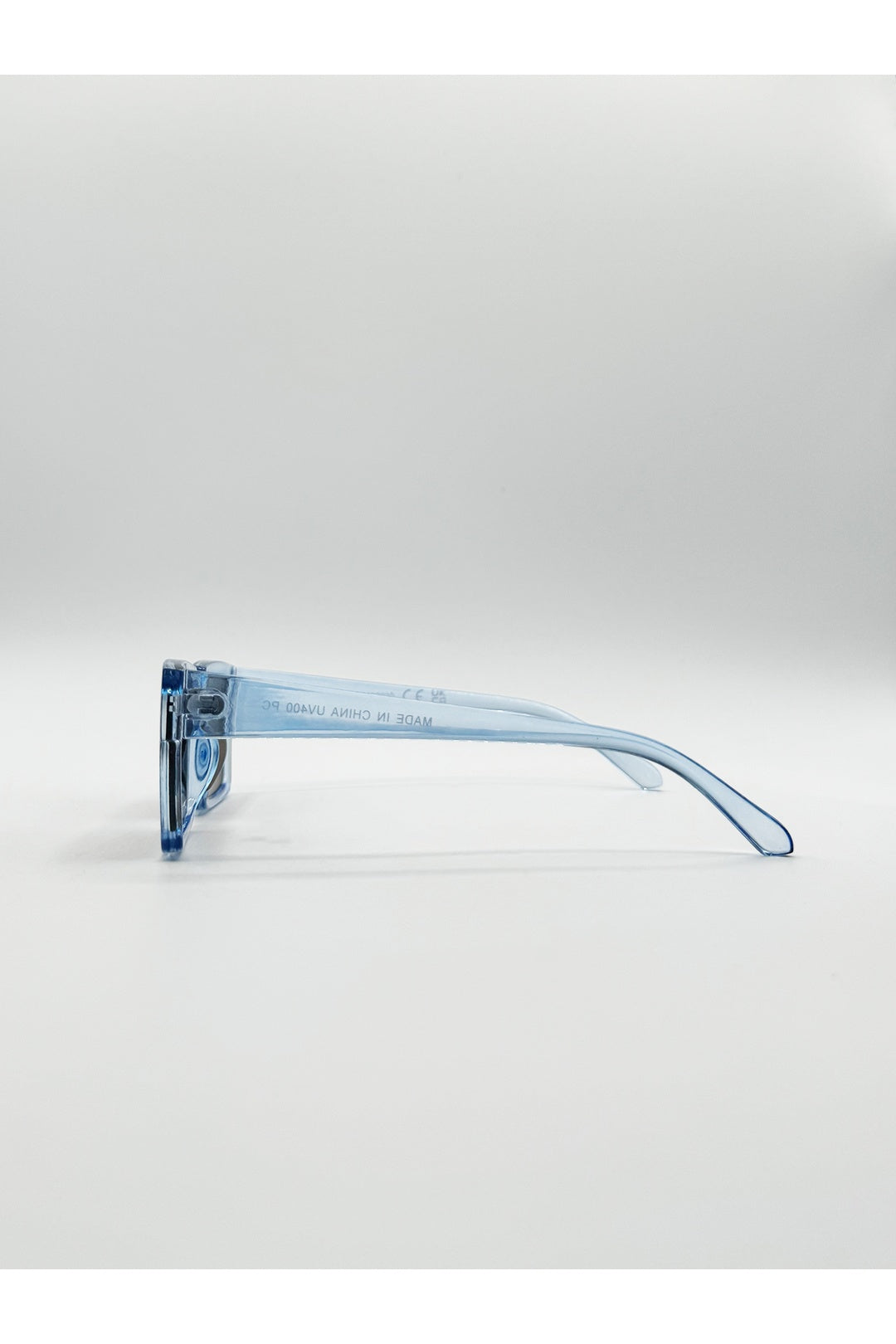 Blue Square Frame Sunglasses in Translucent Blue with Brown Lenses, Image 3 of 4
