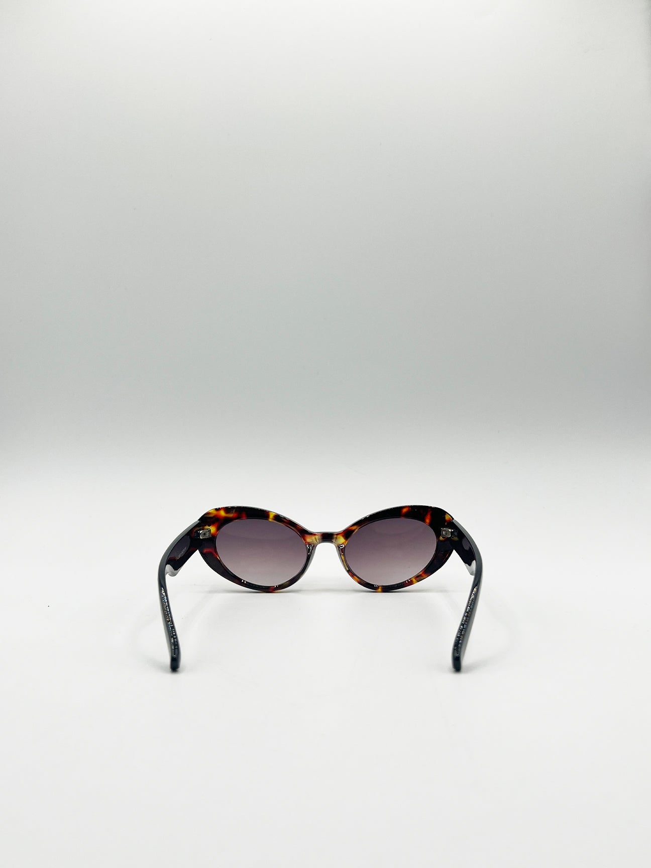 Brown Oval Cat-Eye Sunglasses in Tortoise, Image 6 of 6