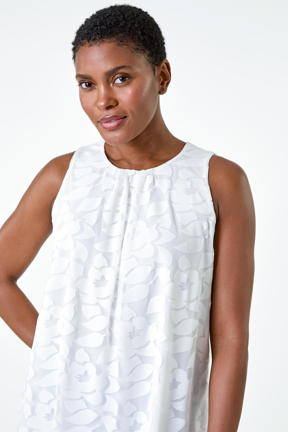 Ivory Sleeveless Textured Floral Print Top, Image 1 of 5