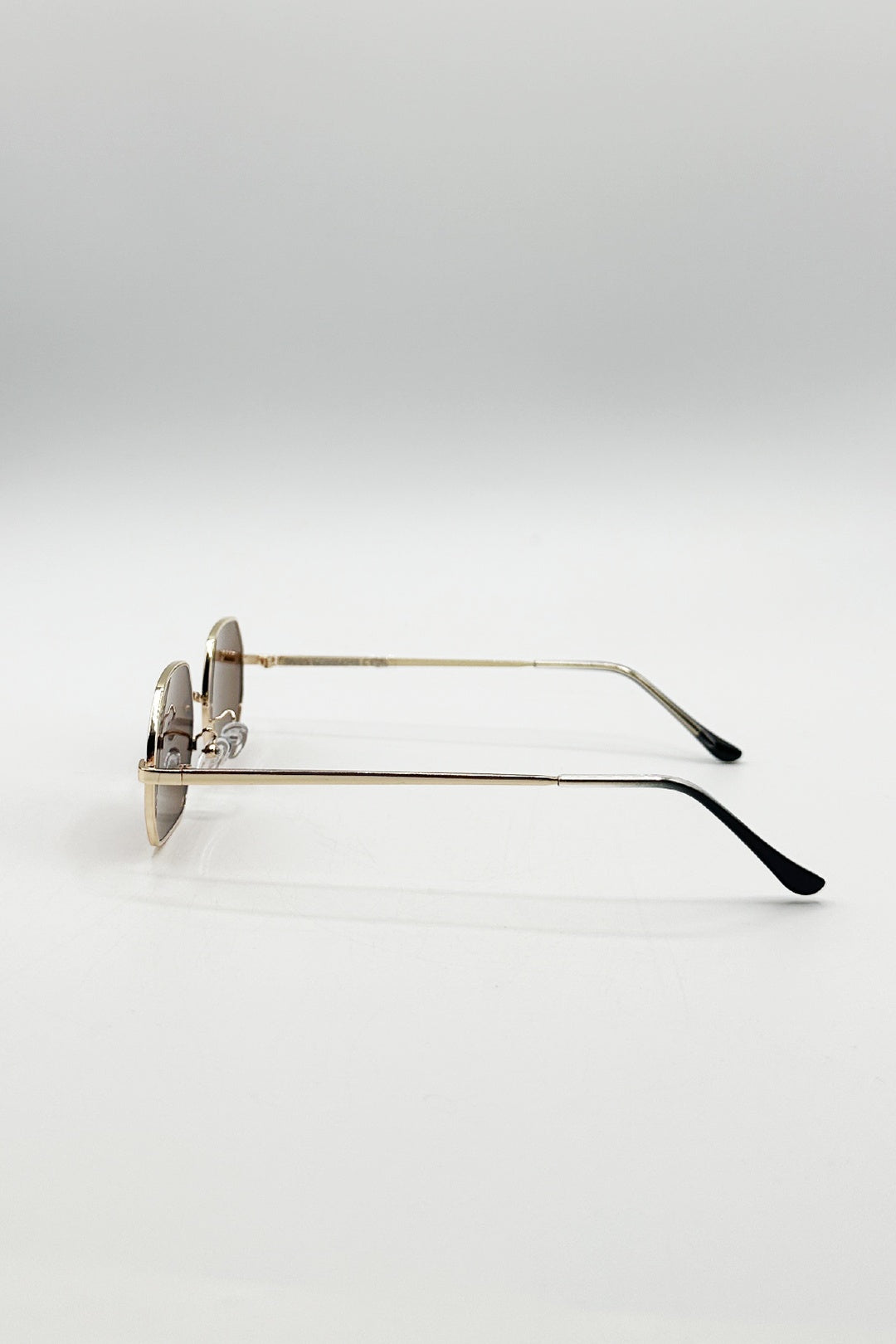 Brown Oval Geometric Metal Frame Sunglasses in Gold Brown, Image 3 of 4
