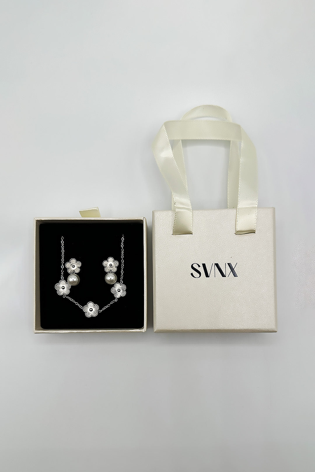 Metallic Floral Pearl Stud Earrings & Bracelet In Silver