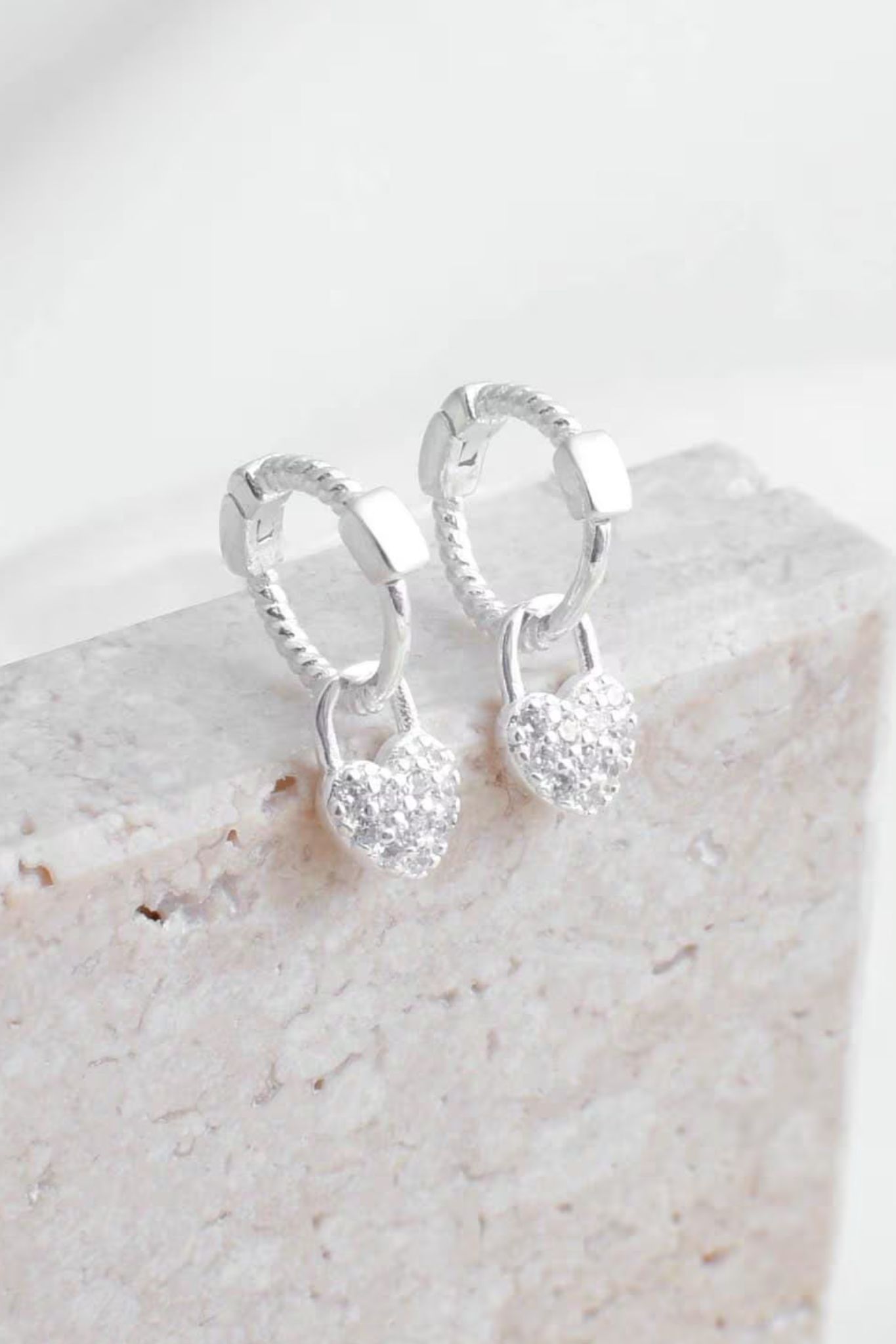 Silver Sterling Silver CZ Heart Huggie Hoop Earrings, Image 1 of 3