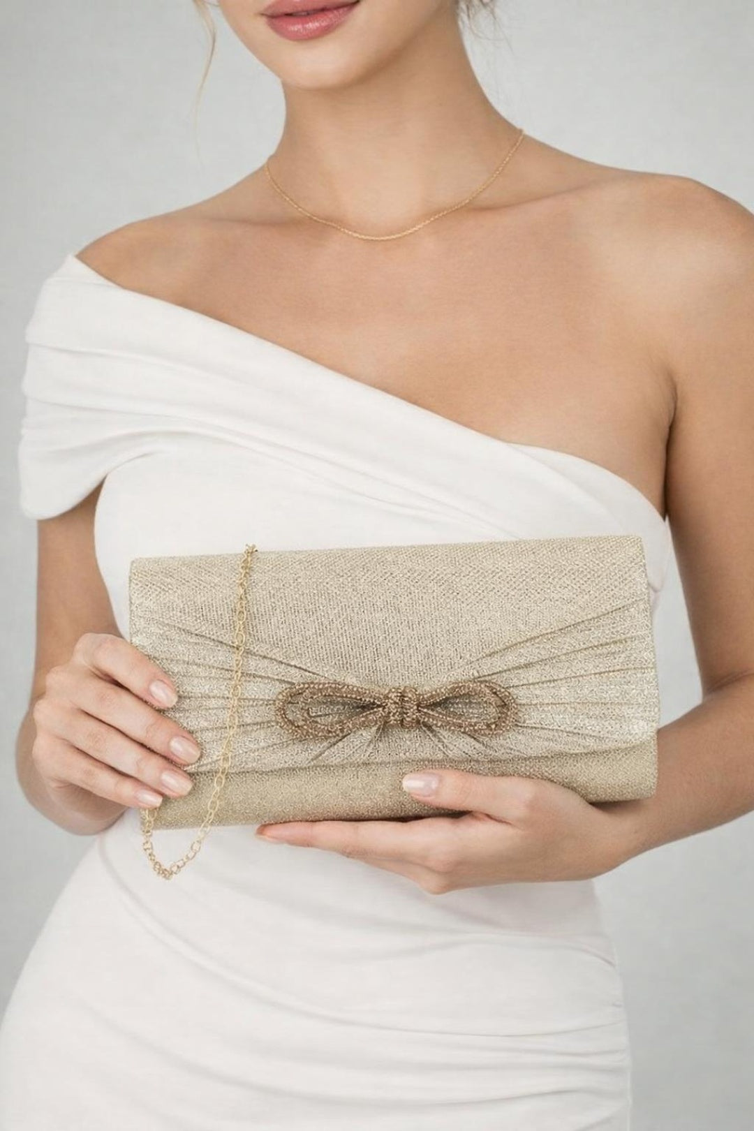 Black Metallic Clutch With Diamante Bow
