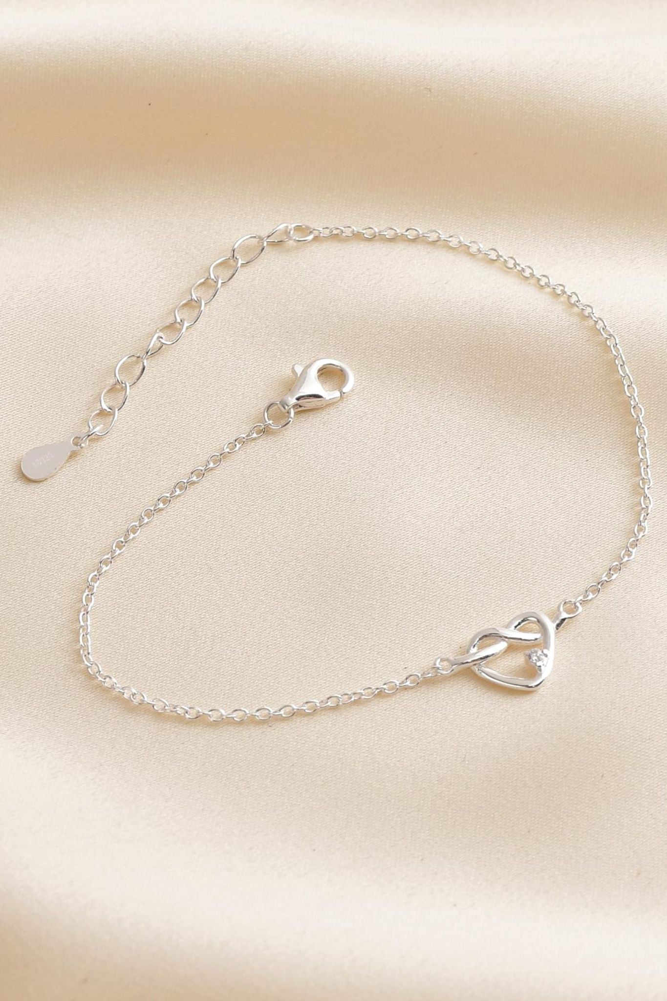 Silver Sterling Silver CZ Love Knot Bracelet, Image 1 of 3