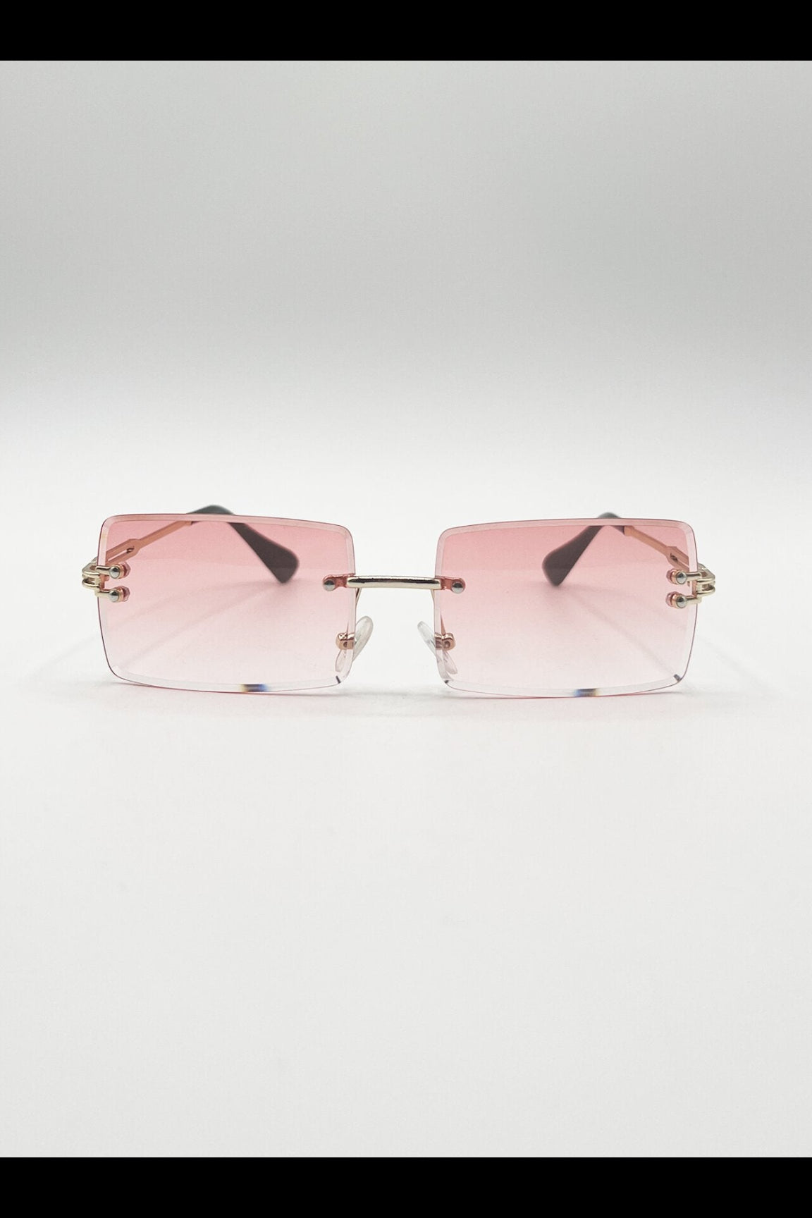 Pink Frameless Square Sunglasses in Pink, Image 1 of 6