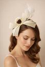 Cream Bow Shaped Fascinator with Satin Loops & Feathers, Image 1 of 1