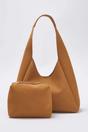 Brown WOVCOR Brown Oval Shoulder Bag With Matching Pouch, Image 1 of 3
