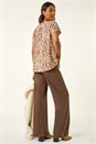 Natural  Animal Print V-Neck Pleat Front Top, Image 3 of 5