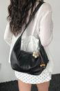 Black Crescent Shoulder Bag With Flower Charm, Image 1 of 3