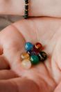 Yellow Gold Pearl Monk Mantra Huggie Earrings, Image 1 of 2